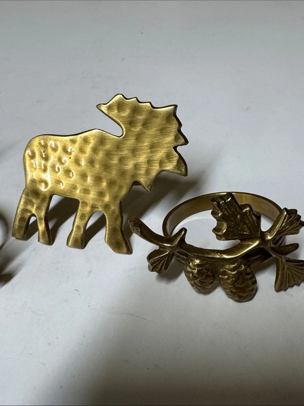 brass moose and pinecone and branch napkin rings set of 4
